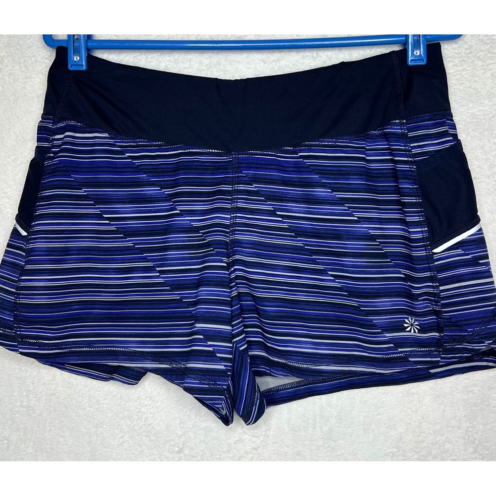 Athleta Womens Blue Purple Striped Running Shorts Size M Zip Pocket Athletic